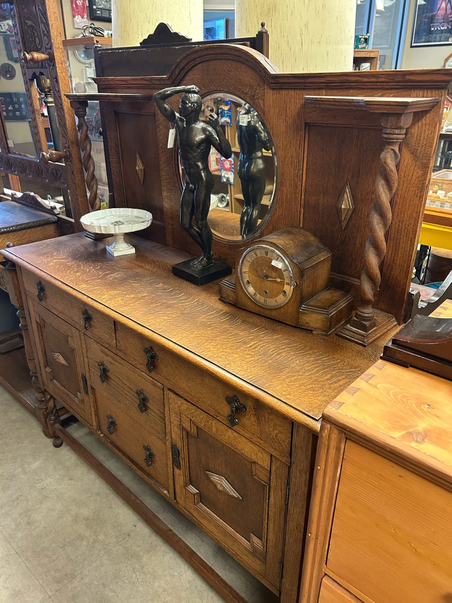 Ornate oak sideboard, mirror and antique clock at Krave Antiques Regina