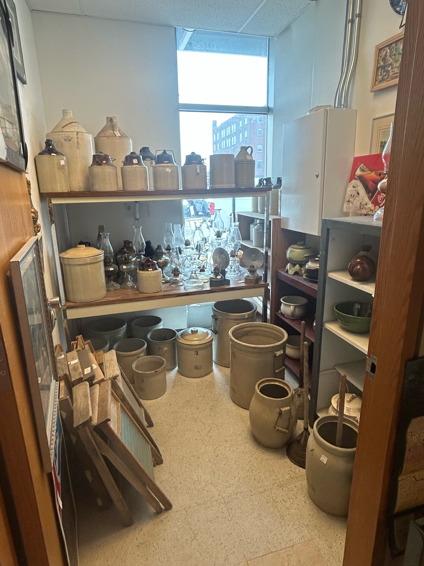 Antique stoneware crocks and vintage glassware at Krave Antiques Regina